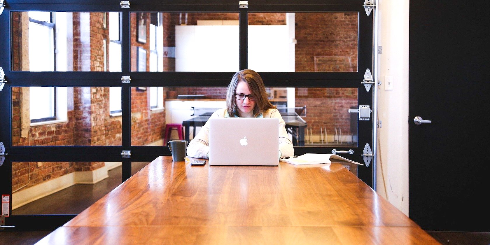 Person typing on a MacBook