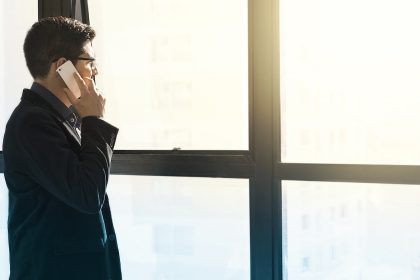 man-speaking-on-phone