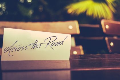 Vintage Styled Image Of A Reserved Sign On A Table At An Outdoor Restaurant