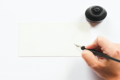 Person-holding-pen