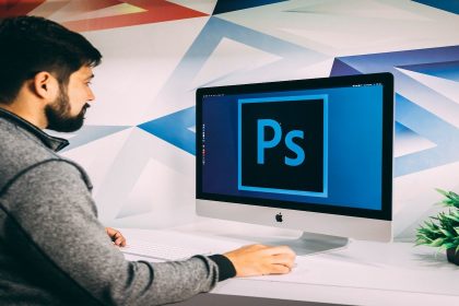 user-using-photoshop-on-computer