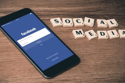 Phone-With-Facebook-Signup-Page-Scrabble-Tiles