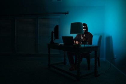 hacker-sitting-with-laptop