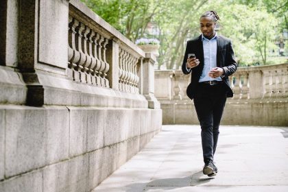 person-walking-on-their-phone