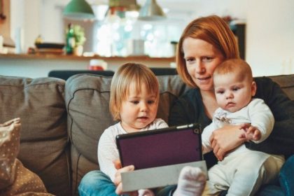 children-and-mother-on-tablet